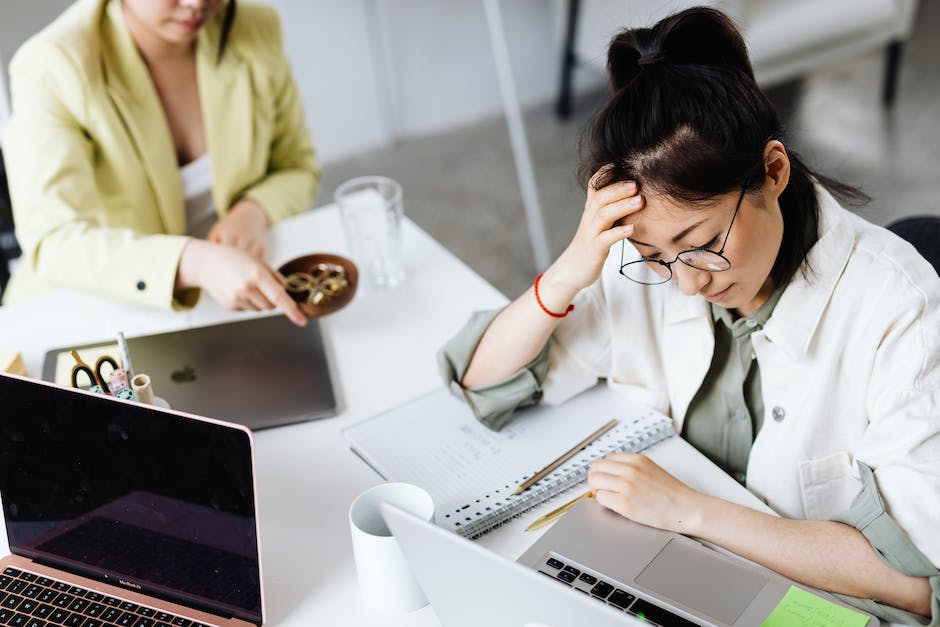 An image depicting a person working happily, symbolizing job satisfaction.