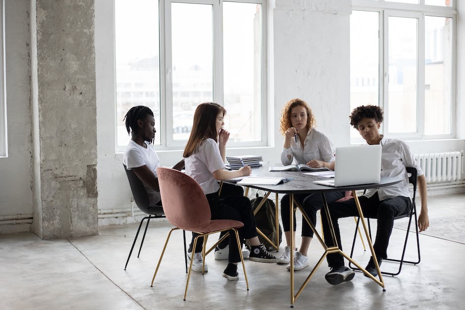 A collage of diverse people working together in an office environment.